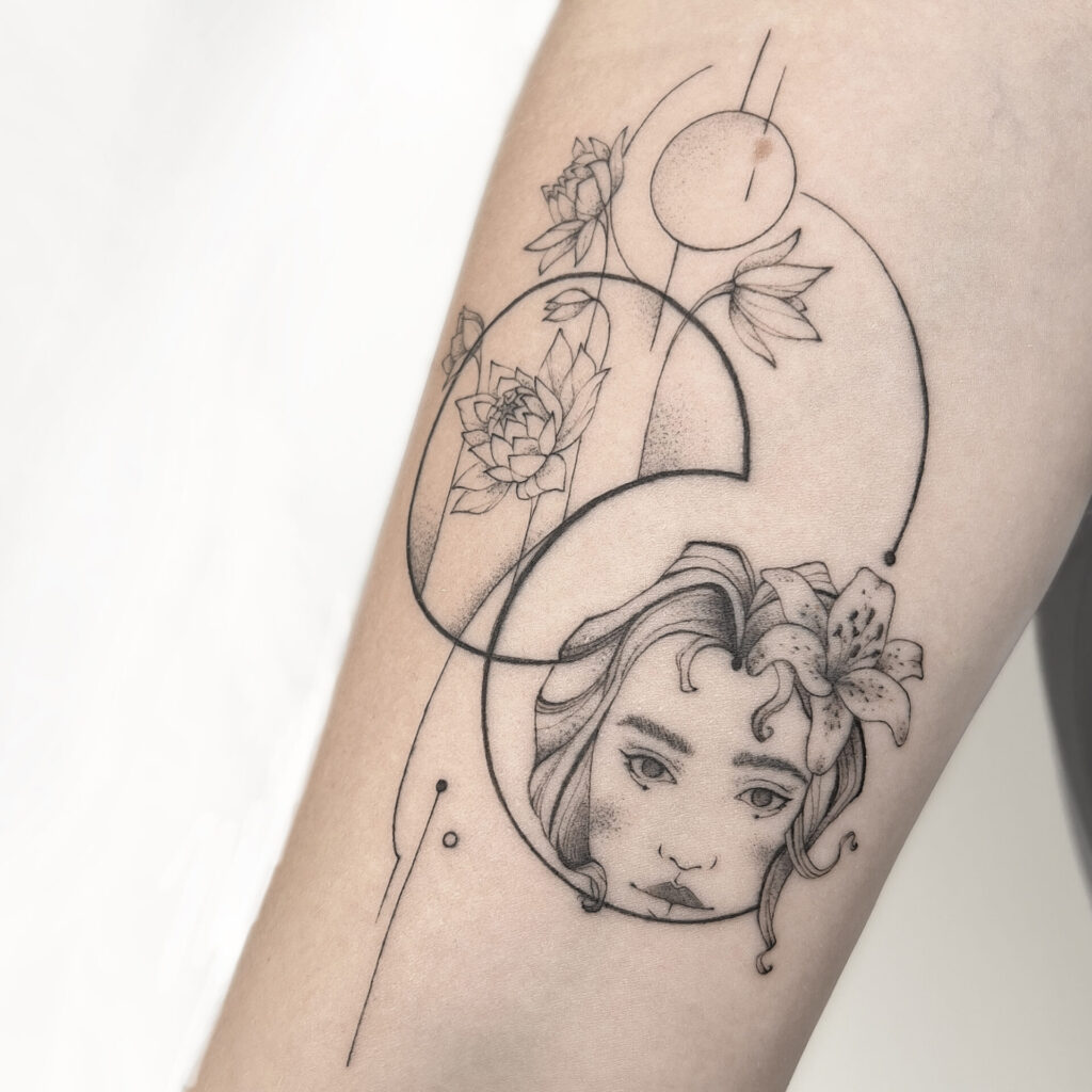 forearm fineline flower woman head tattoo from smasli ink an female tattoo artist working in salzburg austria